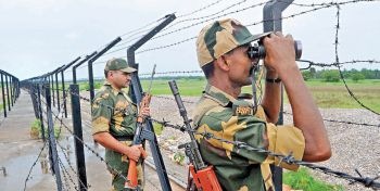  Border Security Force personnel keep vigil at the Masalabari outpost on the Indo-Bangladesh border in Dhubri district of Assam on June 14. There are reasons to believe that some terror cells that plan and execute attacks in India operate from Bangladesh.  