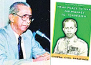 General Cyril Ranatunga and the cover of his book, From Peace to War: Insurgency to Terrorism
