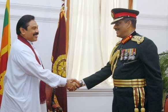 Mahinda Rajapakse (left) and Sarath Fonseka fell out over who should take credit for the victory over the Tamil Tigers
