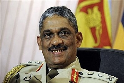 The United States was tightlipped Monday about Sri Lanka's visiting top military commander, after the island said US authorities planned to grill him over alleged war crimes. Sri Lanka summoned the US ambassador to demand the Department of Homeland Security drop plans to question General Sarath Fonseka, pictured in July 2009, over the campaign that crushed Tamil Tiger rebels.