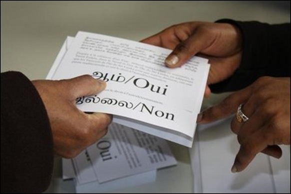 Following the French system of referendum, there were different slips to say 'yes' and 'no'.