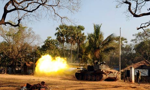 The untold story of the war ... The Sri Lankan army shells Tamil positions in 2009. Photograph: Reuters