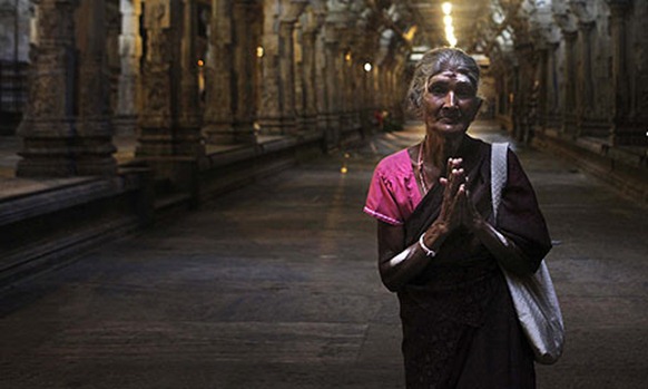A Tamil woman prays at a temple in Colombo. AP