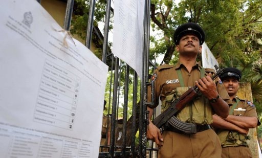 Sri Lankan policemen stand alert