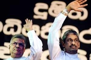  Ranil Wickremesinghe, Sri Lanka’s opposition leader, and Sarath Fonseka, the former army chief and defeated presidential candidate, wave to supporters in Colombo last month. Ishara S Kodikara -AFP