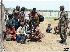 The army claims rebels fired on the civilians as they crossed the lagoon