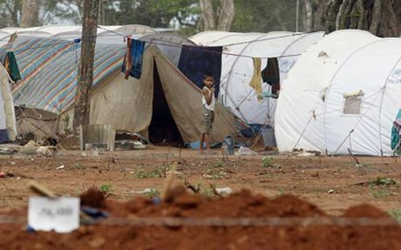  Sri Lankan government has been accused of launching a campaign of "ethnic cleansing" following its victory over the Tamil Tigers  Photo: KIRSTY WIGGLESWORTH/AP  