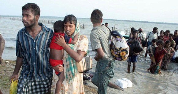 A constant stream of refugees fled the war zone in the last days of the conflict [EPA]