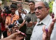 Sri Lankan left wing leader Somawansa Amarasinghe speaks to the media after casting his vote, outside a polling booth in Colombo, Sri Lanka, Thursday, April 8, 2010. Sri Lankans faced a clear choice in parliamentary elections Thursday between further strengthening the president's hand in deciding the nation's postwar fate or trying to check his power. (AP Photo Chamila Karunarathne )