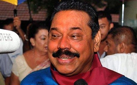 Sri Lankan president Mahinda Rajapaksa speaking to the media after casting his vote for the parliamentary elections at Madamulana in Hambanthota Photo EPA