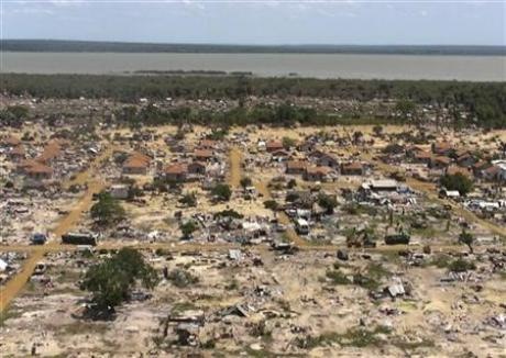 An aerial view of the former battlefront is seen from the helicopter carrying U.N. Secretary-General Ban Ki-moon during his visit to the refugee camp known as Manik Farm, on the outskirts of the northern Sri Lankan town of Vavuniya May 23, 2009. Credit: Reuters Louis Charbonneau