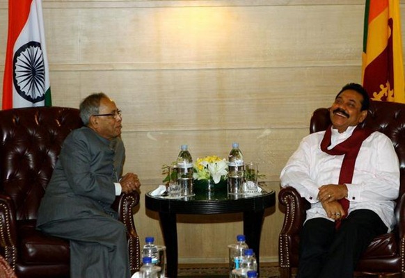 PTI Union Finance Minister Pranab Mukherjee and Sri Lankan President Mahinda Rajapaksa during a meeting in New Delhi on Tuesday. pti