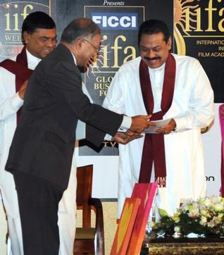 PTI STRENGTHENING RELATIONSHIP: Sri Lankan President Mahinda Rajapaksa (right) and Indian High Commissioner to Sri Lanka Ashok Kantha (left) during the FICCI-IIFA Global Business Forum in Colombo, Sri Lanka, on Friday.  pti