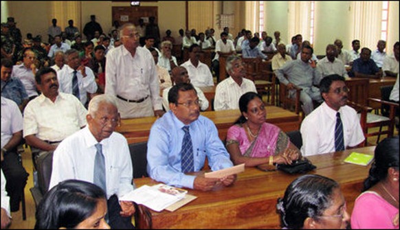 Professor S.K. Sitrampalam speaking to the Indian Foreign Secretary at the gathering of civil society representatives in the Public Library of Jaffna