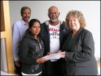 Mrs Thevaki Kumar hands over an appeal to Ms. Jean Lambert MEP, the chair of the South Asia delegation in the European Parliament in Strasbourg.