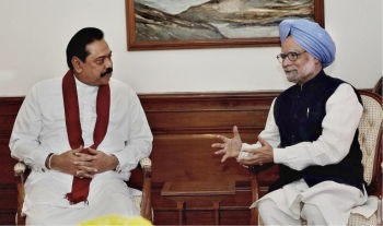  Cordial talks:Prime Minister Manmohan Singh makes a point to Sri Lankan President Mahinda Rajapaksa at a meeting in New Delhi on Friday. Colombo said it would talk to a broad spectrum of stakeholders to build a consensus.