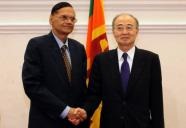 Sri Lankan Foreign Minister Gamini Lakshman Peiris (L)