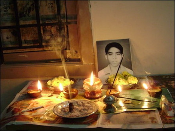 Homage paid in silence under oppressed circumstances inside a house at a locality in the NorthEast on Saturday