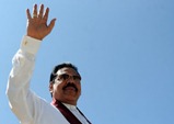 Mahinda Rajapakse is to take his oath of office on an open-air stage overlooking the Indian Ocean