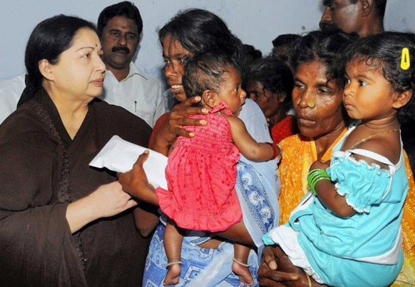 PTI AIADMK General Secretary J Jayalalithaa consoling the relatives of Tamil Nadu fisherman Jayakumar, who was allegedly killed by the Sri Lankan navy, at Pushpavanam village in Nagapattinam district on Wednesday. Photo PTI 