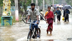 The floods have destroyed swathes of farmland and killed at least 40 people 