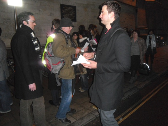 Act Now campaigners handing out leaflets to attendants in the Queue.