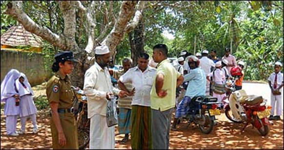 Parents say they were chased away when requested the examination officials to provide teachers who spoke and understood Tamil