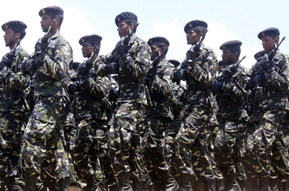 Sri Lankan soldiers celebrate the anniversary of the end of the civil war - but many suspected Tamil fighters still remain in custody [EPA]