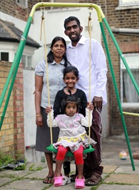 Close family: shopkeeper Shiva Kandiah has the support of his neighbours as well as wife Baskary and daughters Shivaanthy, six, and Dibika, two