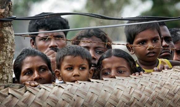 Internally displaced Tamils at a camp Sri Lanka, where those forcibly removed from the UK face risk of maltreatment, say charities. Photograph: Eranga Jayawardena AP