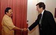 Sri Lankan President Mahinda Rajapakse (L) shakes hands with US Assistant Secretary of State Robert Blake (R) in Colombo (AFP Presidential Office)
