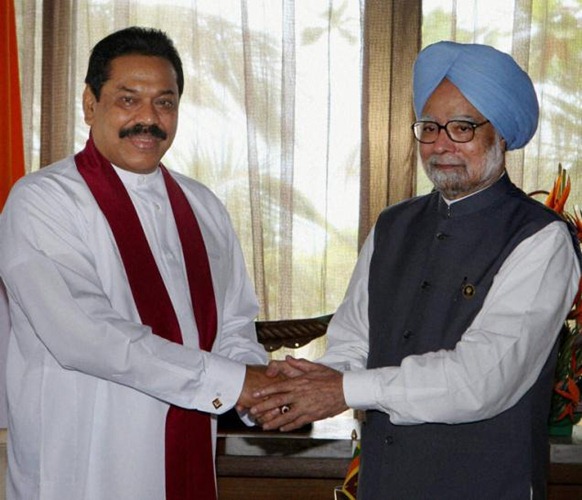 PTI Prime Minister Manmohan Singh greets Sri Lankan President Mahinda Rajapaksa on the sidelines of the SAARC Summit at Addu in Maldives. Photo: Subhash Chander Malhotra 