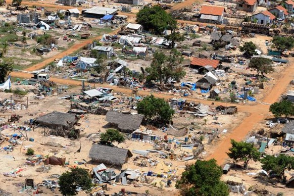 Destroyed houses are seen in an abandoned conflict zone where Tamil Tigers separatists made their last stand before their defeat by the Sri Lankan army.