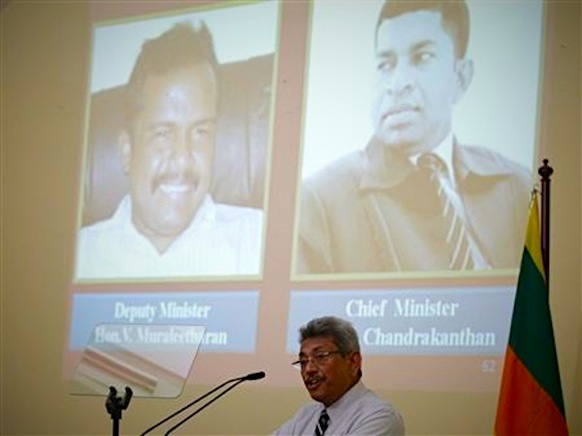 gv caption: Three terrorists, two terrorists, former terrorists, patriots or a hero? How one sees this image is  measure of how much Sri Lanka remains divided post-war. Image shows Secretary of Defense Gotabaya Rajapaksa speaking during the inaugural National Conference on Reconciliation in Colombo November 24 ,2011. REUTERS/Dinuka Liyanawatte, courtesy MSNBC.