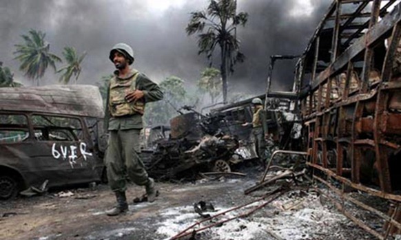 Sri Lankan soldiers inside the war zone in the north of the country at the end of the civil war in May 2009. Photograph: AFP Getty Images