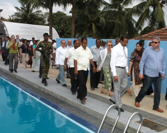 Indian-orchestrated delegates visiting a ‘development’ site - a swimming pool constructed in a leading school in Jaffna by diverting funds allocated to schools in war-torn Vanni. 