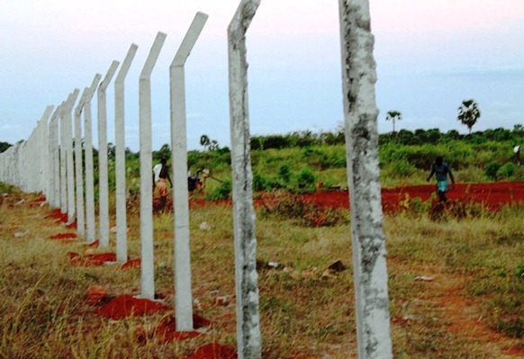 Freshly-laid permanent fence for the Sinhala military region in the northern coast of Jaffna