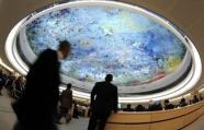 Delegates are seen during a special session of the UN Human Rights Council in Geneva (AFP/File, Fabrice Coffrini)