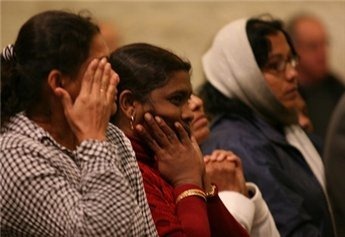 Sri Lankans from Israel join Palestinians for a church service in Bethlehem marking the birthday of the president of Sri Lanka. MaanImages/Haytham Othman, File)