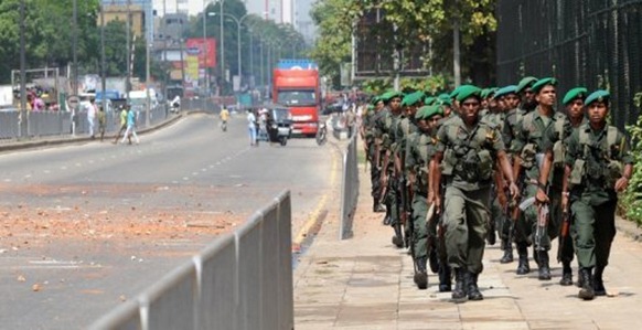 Sri Lanka's president says troops are in various areas, not just the north (AFP/File, Ishara S.Kodikara)