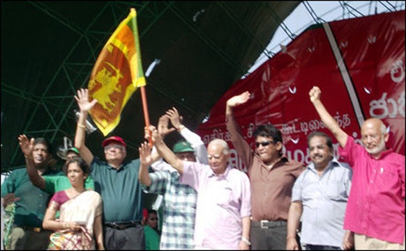 The sequence of UNP, TNA leaders waving to the crowd and the appearance of the Lion flag [Photos: TamilNet]