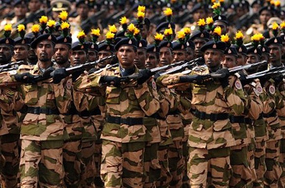 Sri Lankan police personnel have marched in a military parade during a Victory Day parade in Colombo [AFP] 