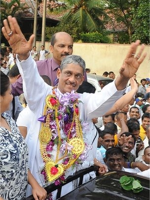 Hundreds of supporters gathered to cheer Sarath Fonseka as he left prison on Monday