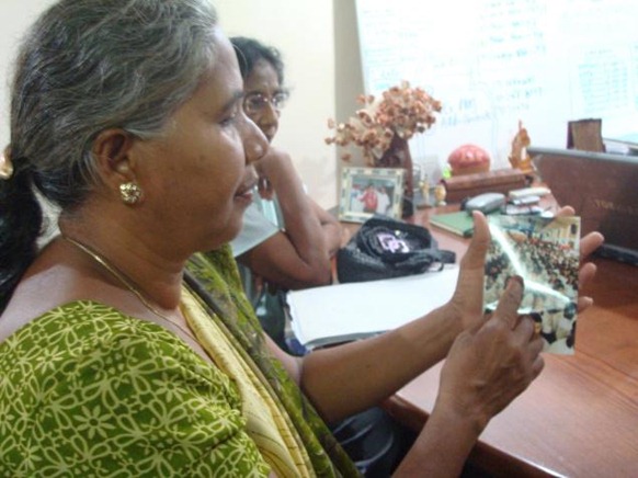 The Hindu Saroja Devi from Uppumaveli, Mullativu, pointing out her son Leon Roxy from a picture taken by me (The Hindu's correspondent in Sri Lanka) in September 2011 on Tuesday in Colombo. Photo : R.K. Radhakrishnan 