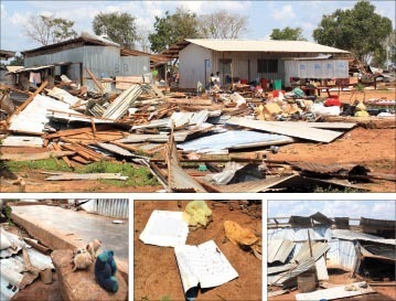 Collapsed houses after a storm ripped through Zone 1 of Menik Farm, damaging 942 shelters. Although the houses were quickly rebuilt, the inmates continue to beg for a chance to go back to their homes, Children's toys lie forlornly in the aftermath of the storm , Schoolbooks scattered and torn. The school inside had collapsed and Several people were injured when the roofs collapsed on their heads