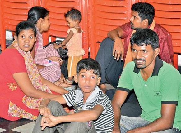 Sri Lankan Tamil refugees held by ‘Q’ branch police who thwarted their attempt to go by boat to Australia Thursday night. The 61 detained persons includes one Indian. The rest came from different refugee camps in the state. They are housed at a marriage hall in Kancheepuram. - DC