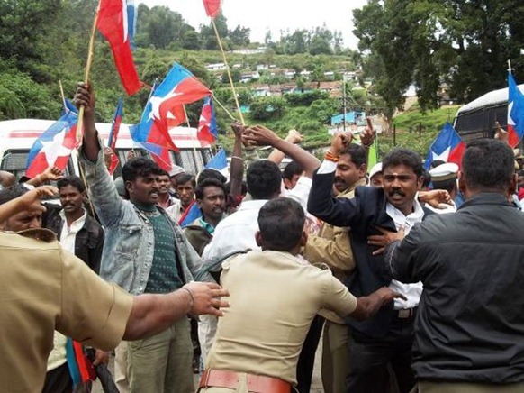 Special Arrangement Members of Viduthalai Chiruthaigal Katchi (VCK) being arrested after they staged a demonstration against the presence of Sri Lankan defence officers at a training programme in Wellington on Tuesday. 