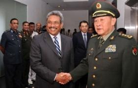 Chinese Defence Minister Liang Guanglie (R) shakes hands with Sri Lankan Defence Secretary Gotabhaya Rajapakse (AFP/Army Media)