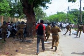 Sri Lankan police officials clash with university students in Jaffna (AFP)