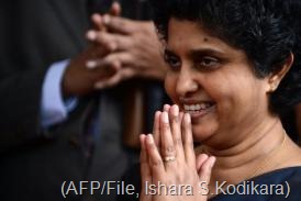 Sri Lanka?s Chief Justice Shirani Bandaranayake gestures as she exits The Supreme Court in Colombo, December 4, 2012 (AFP/File, Ishara S.Kodikara)